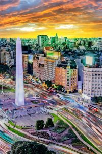 Argentina Buenos Aires downtown with traffic cars at night arround the Obelisco